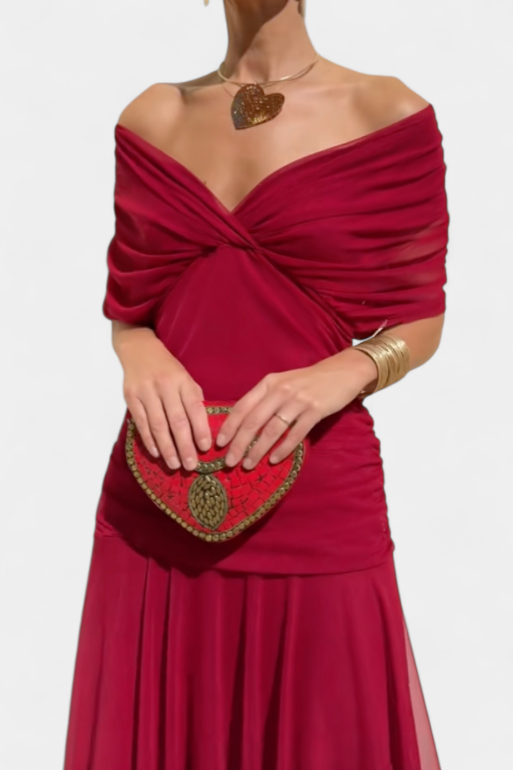 Women's off-shoulder party dress with flattering ruching and a stylish twist-front.