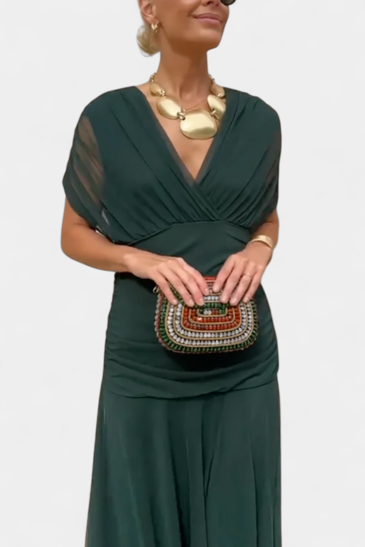 Sophisticated women's off-shoulder formal midi dress with ruched twist-front.