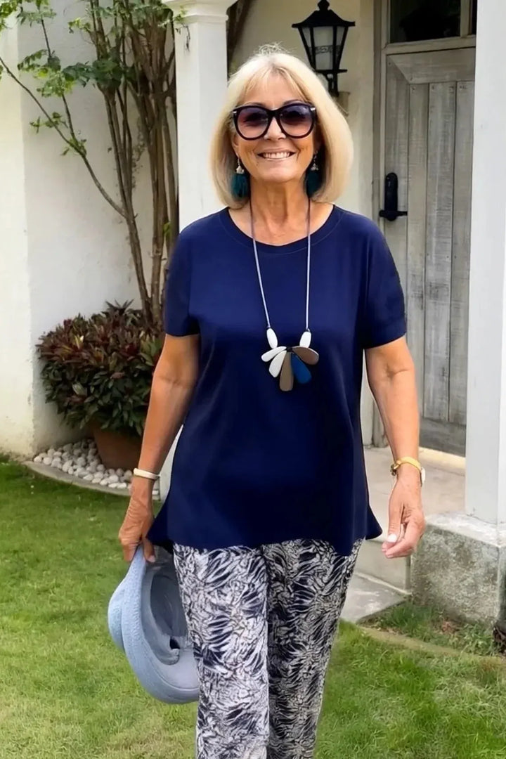 Stylish women's printed blouse for office or casual wear. Comfortable, elegant, and versatile long sleeve top.