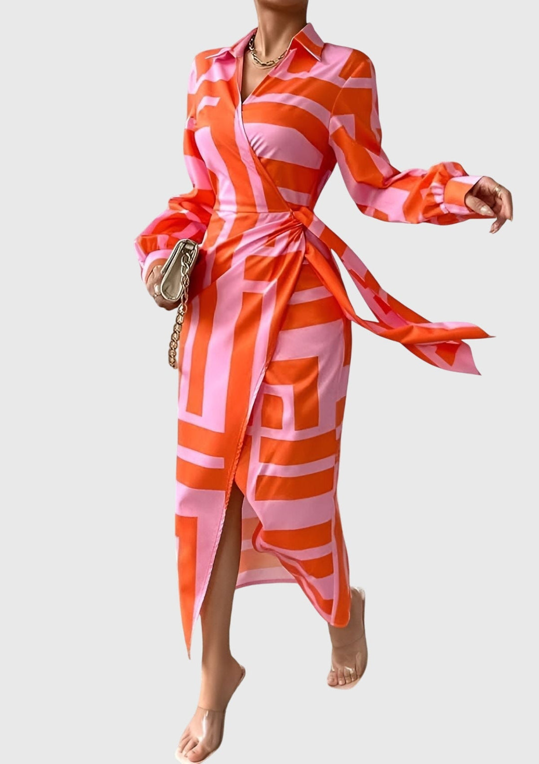 Women's elegant printed wrap midi dress. Flattering fit, long sleeves, modern print for versatile style.