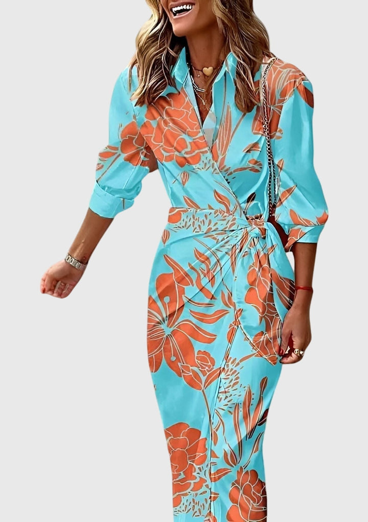 Women's elegant printed wrap dress. Flattering midi, long sleeve design, versatile for chic spring/summer day-to-night fashion.