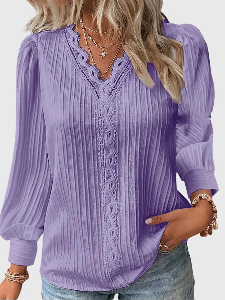 Chic women's pullover blouse, a stylish and versatile long sleeve top for modern office & casual looks.