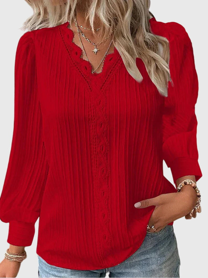 Comfortable & elegant women's pullover blouse, a versatile long sleeve top for stylish daily wear.