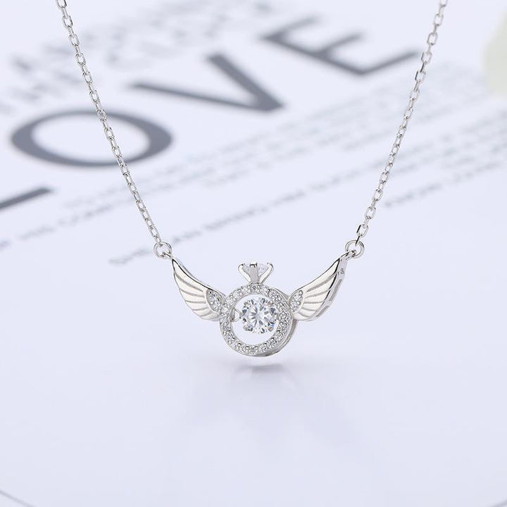 Versatile women's titanium steel angel wing necklace, available in rose and white gold, elegant gift.