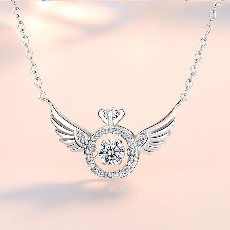 Women's necklace featuring a captivating angel wing design in polished titanium steel, rose gold.