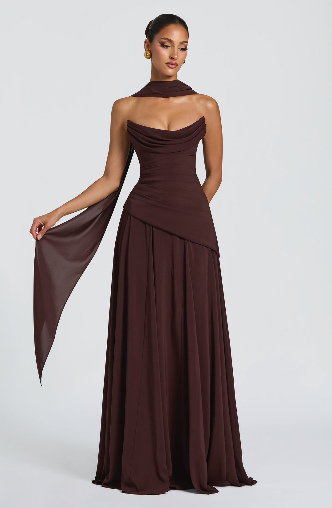 Elegant women's long party dress, featuring a ruched bodice and stylish halter neck design.
