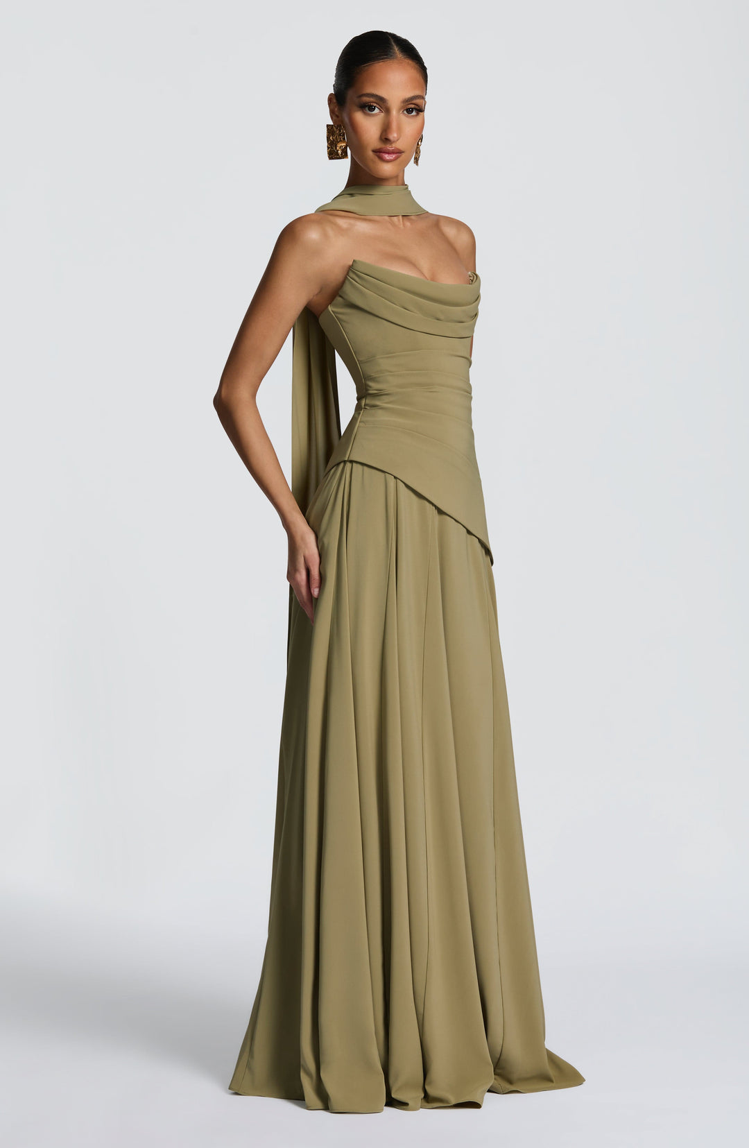 Chic women's formal halter neck maxi dress. Ruched detailing adds elegance for special events.