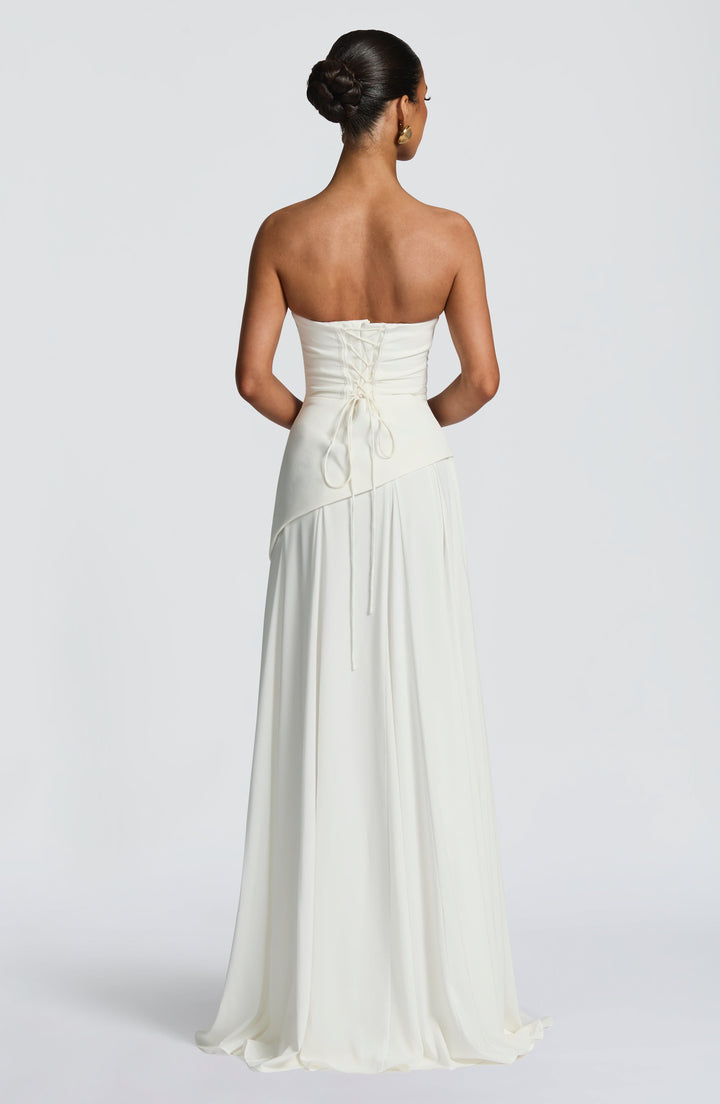 Stylish women's long formal dress, a ruched halter neck maxi perfect for evening events & galas.