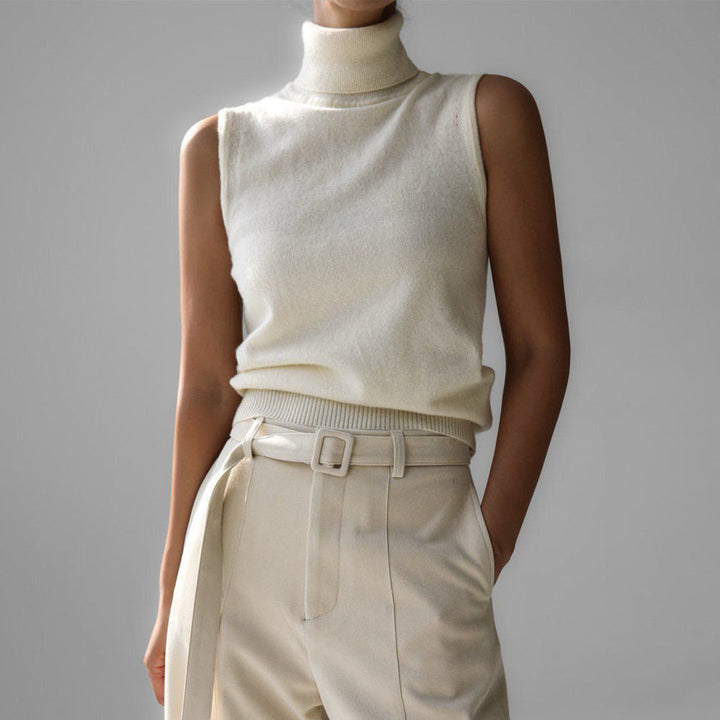 Women's elegant sleeveless mock neck knit top, slim fit for a chic look.
