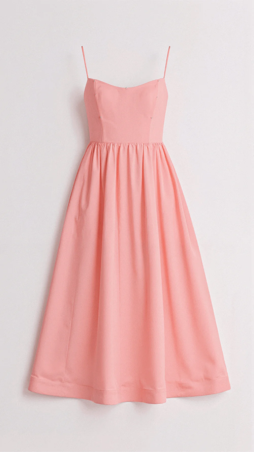 Modern women's casual summer midi dress, fit & flare cut, delicate spaghetti straps, and scoop neckline.