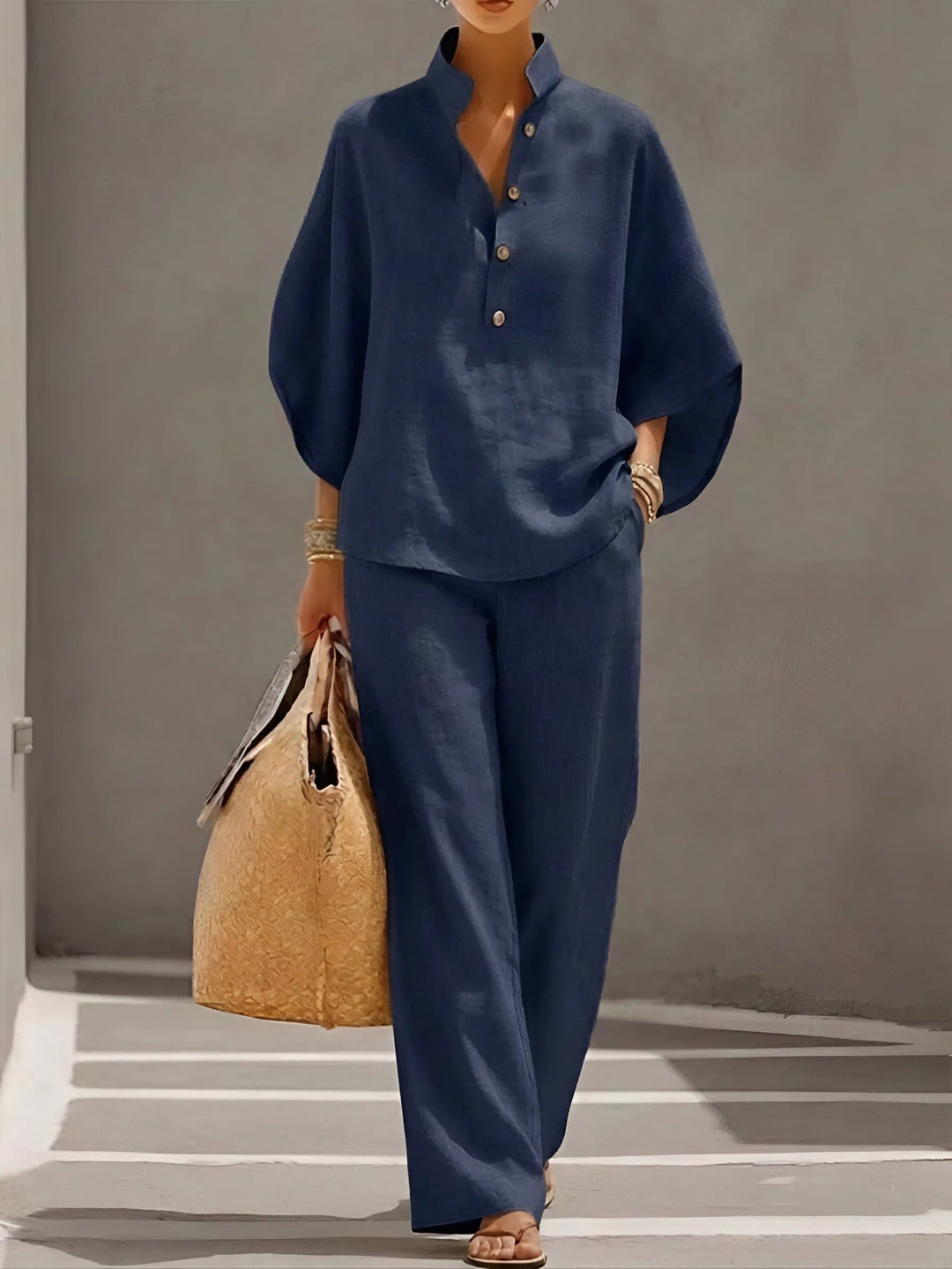 Chic women's clothing set with a kimono sleeve top & comfortable wide leg pants, ideal for summer outfits.