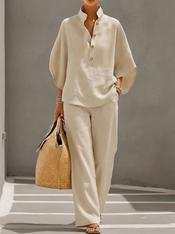 Summer outfit: Women's two-piece set with a kimono sleeve top and stylish wide leg pants.