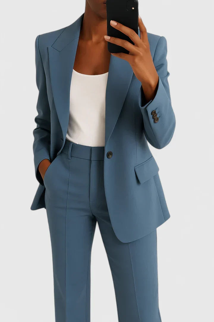 Classic women's two-piece suit, versatile for professional business attire & formal events.