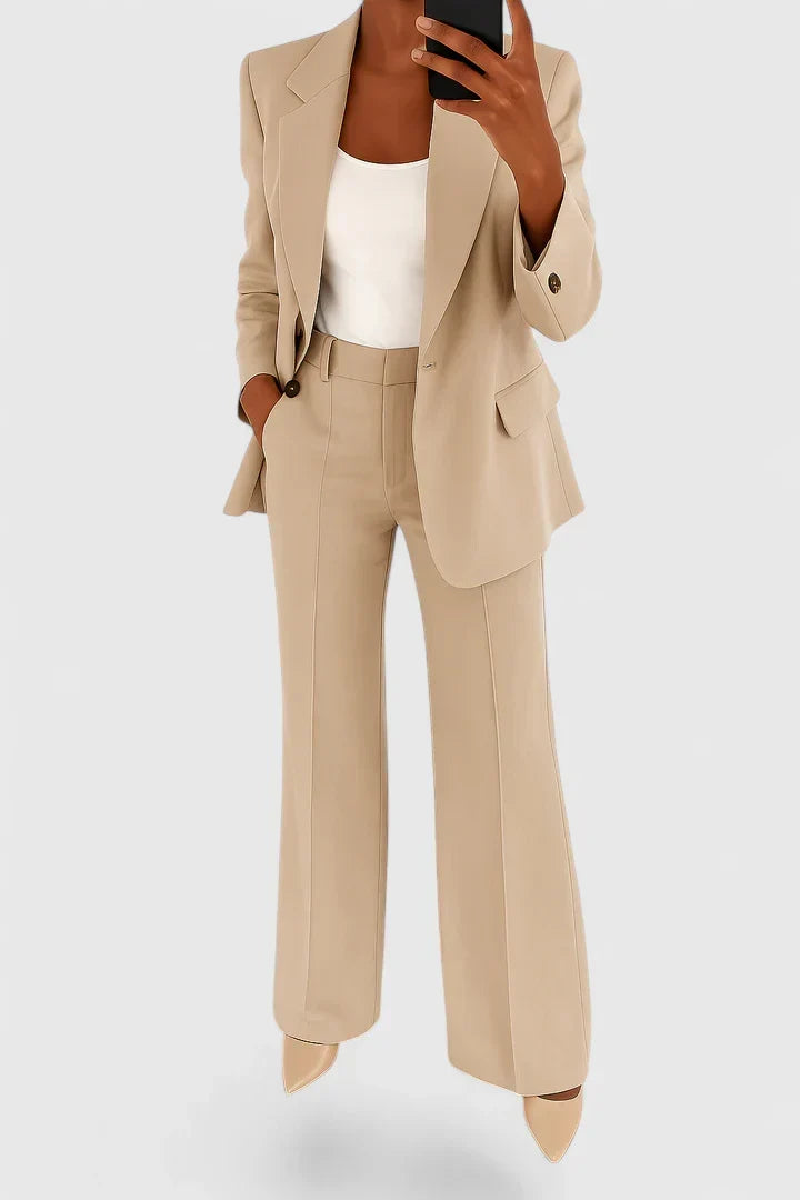 Professional women's two-piece suit, ideal for formal business attire & sophisticated office look.