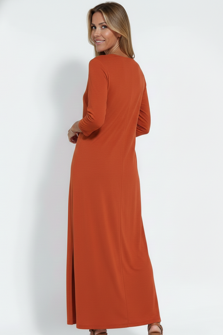 Vibrant women's sleeveless maxi dress with a graceful V-neck and side slit, embodying casual chic summer.