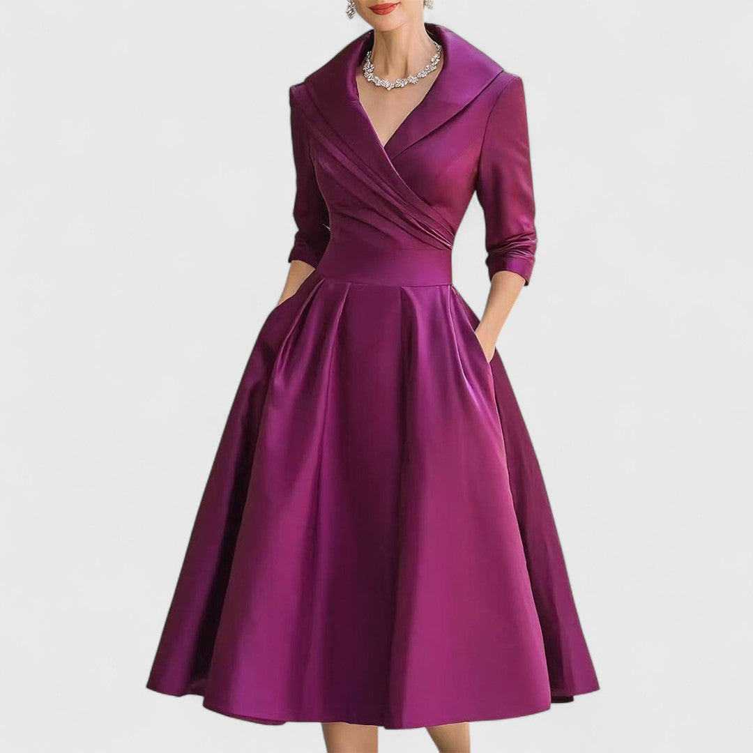 Versatile women's midi dress, elegant V-neck and 3/4 sleeves, suitable for any occasion.