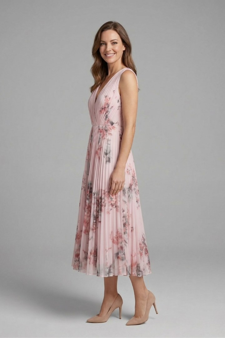 Flattering women's V-neck pleated midi dress, a stylish sleeveless design for everyday elegance.