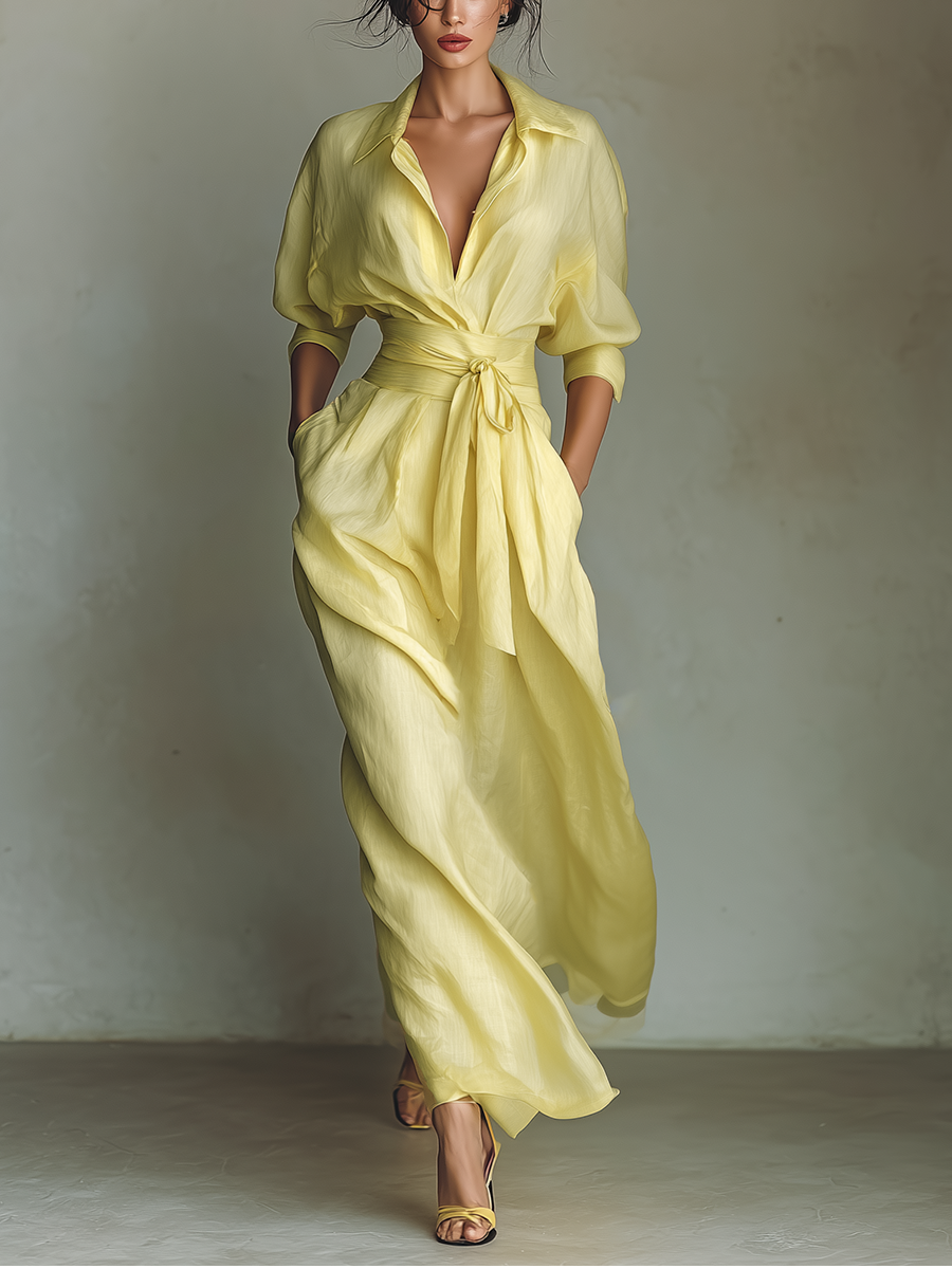 Women's elegant yellow maxi shirt dress. Long, casual style with tie-waist, perfect for summer fashion and resort.