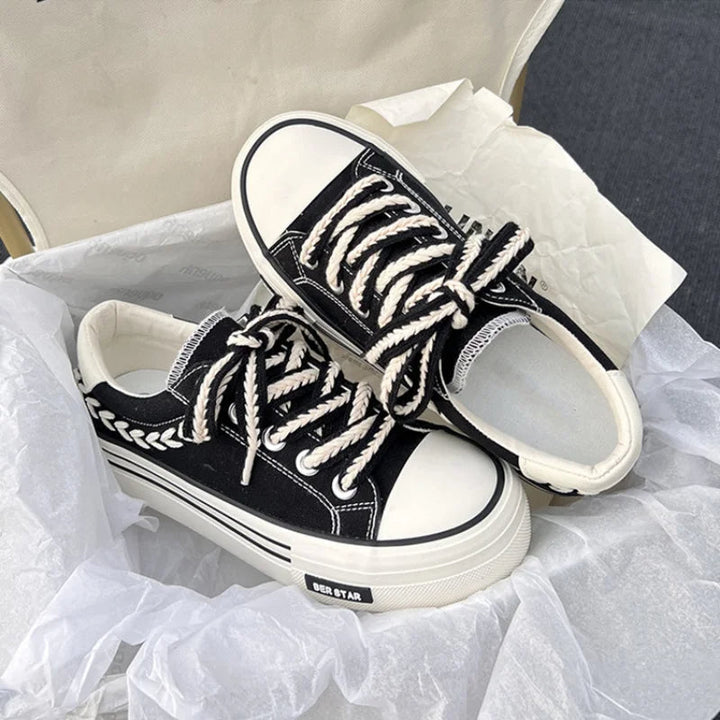 Stylish women's lace-up platform sneakers, new, offering elevated comfort & height. Ideal for spring/summer fashion.