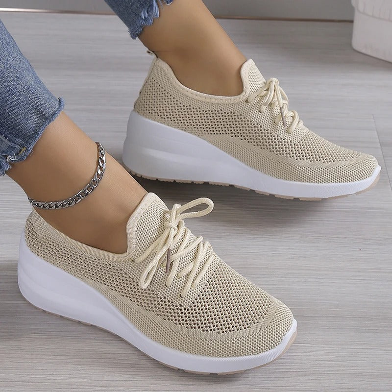 Women's elevated platform wedge sneakers for ultimate comfort and stylish everyday wear.