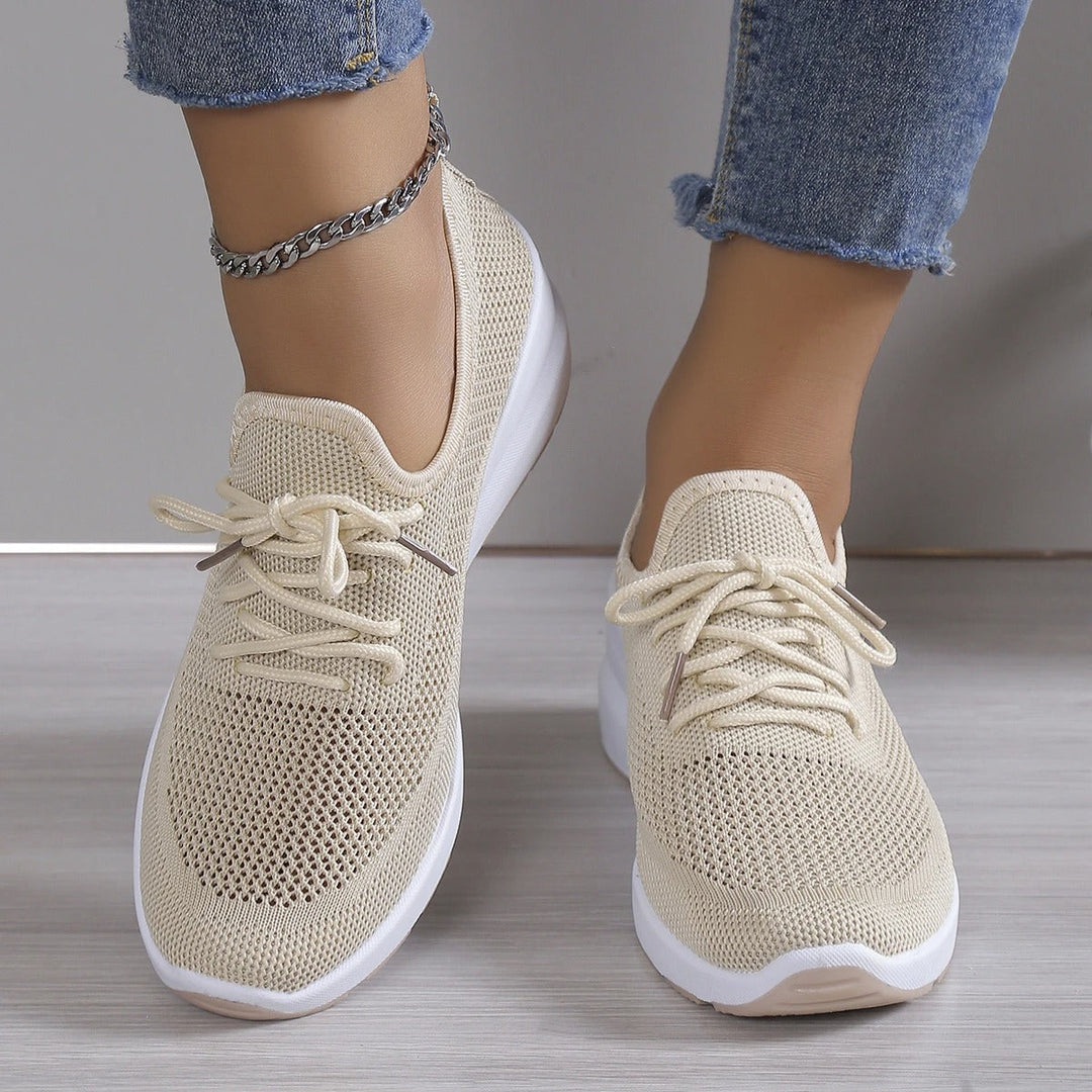 Lightweight slip-on wedge sneakers for women, featuring a comfortable elevated platform.