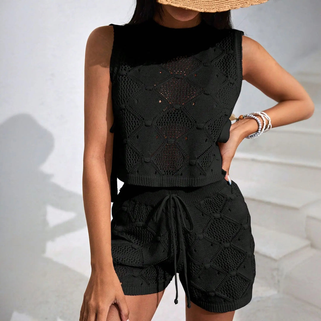 Soft knitted crochet two-piece set for women. Elira crop top & shorts combo, essential for summer comfort.