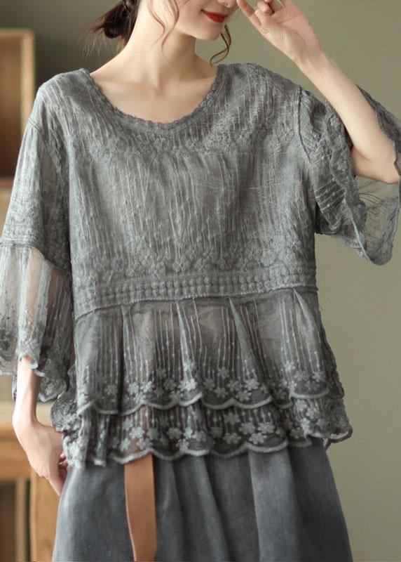 Elegant casual women's half sleeve blouse, perfect for summer, featuring intricate floral embroidery and a pretty lace hem.