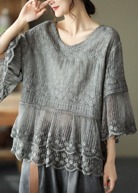 New arrivals: Women's lightweight embroidered blouse with a bohemian feel, half sleeves, and stylish tiered lace hem.