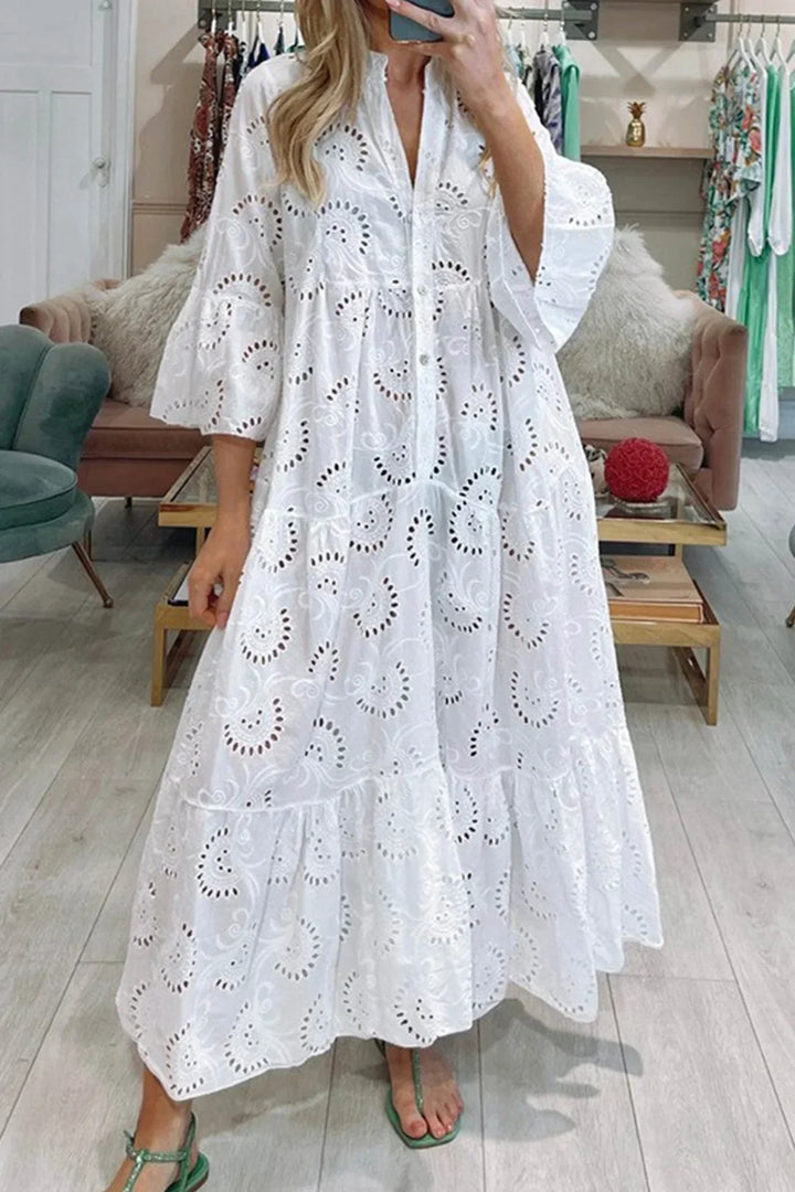 Women's embroidered boho flowy maxi dress, perfect for summer vacation and resort wear.