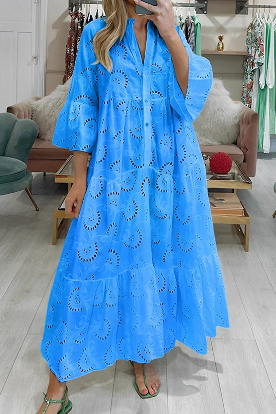 Trendy women's flowy maxi dress, embroidered boho style, perfect for summer and resort fashion.