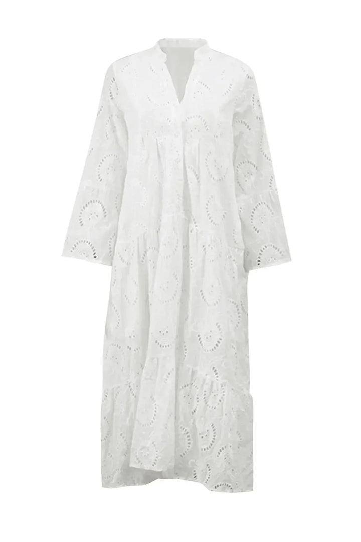 Unique bohemian embroidered flowy maxi dress for women, capturing effortless summer style and charm.