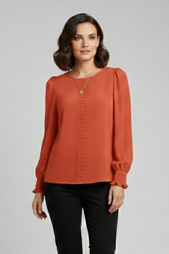 Comfortable women's embroidered round neck blouse with long sleeves, perfect for casual wear and everyday fashion.