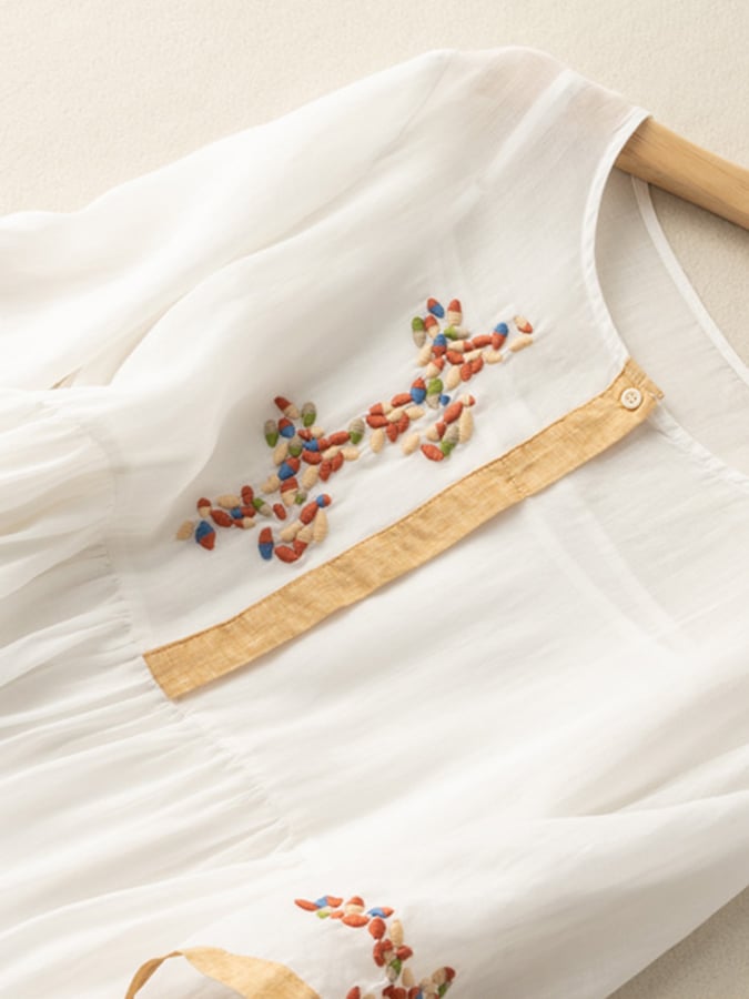 Versatile women's loose fit midi dress, featuring beautiful embroidery, mid sleeves, and a comfy round neck.