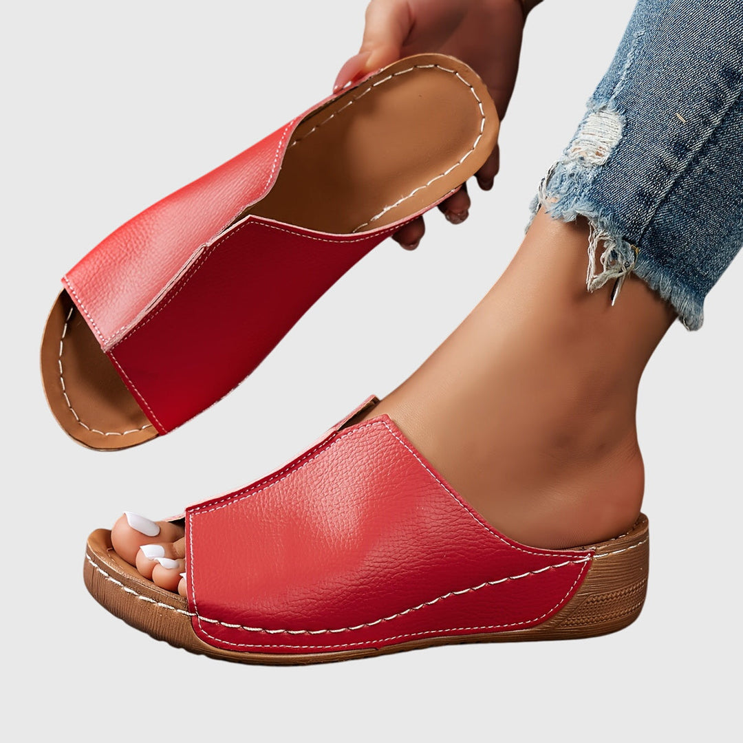Open-toe ergonomic flat sandals for women, offering superior comfort, foot support & adjustable fit. Summer.