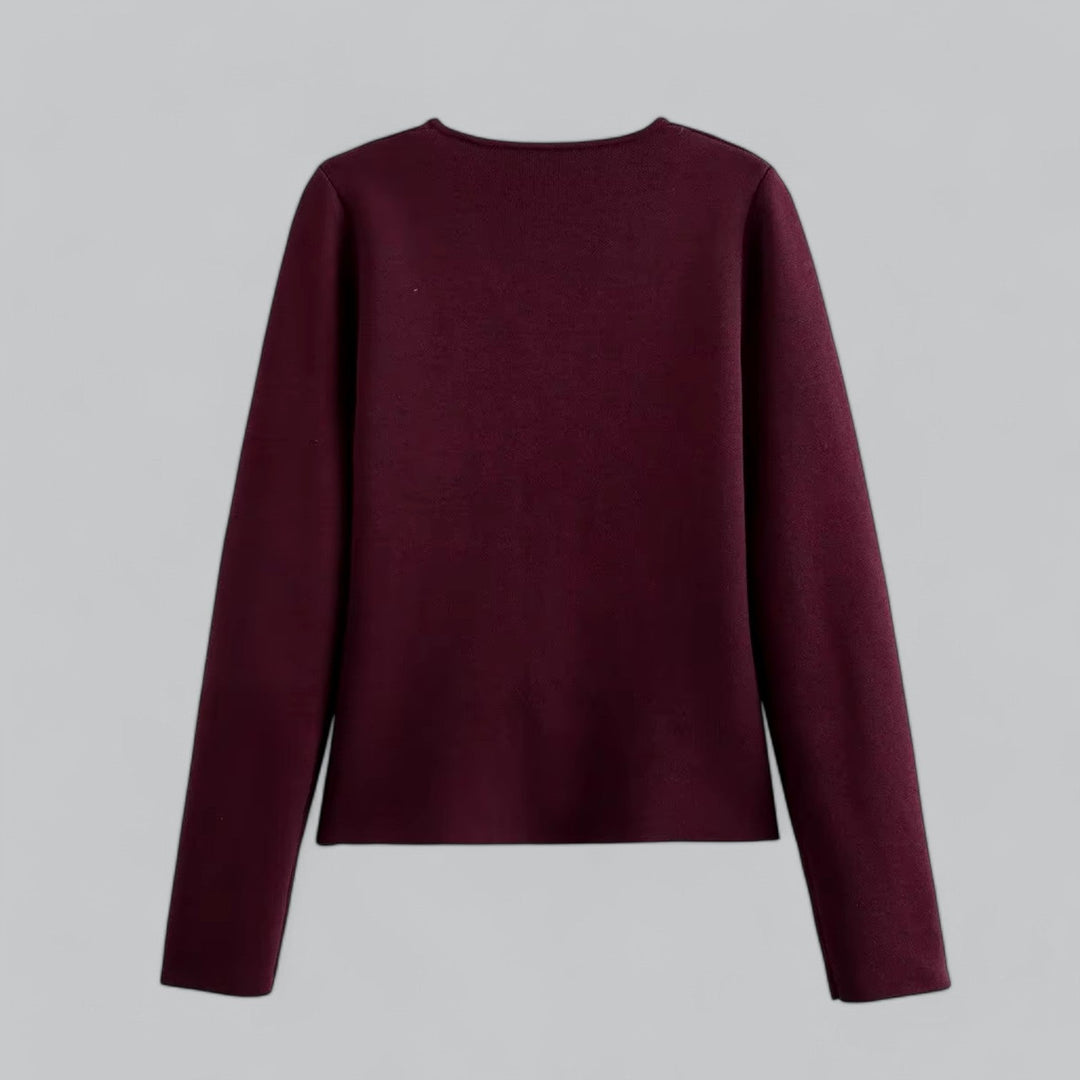 Elegant women's cardigan with functional buttons, ideal for lightweight layering in warmer seasons.