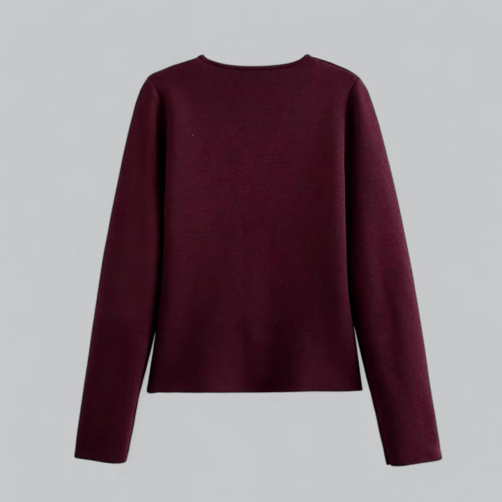 Elegant women's cardigan with functional buttons, ideal for lightweight layering in warmer seasons.