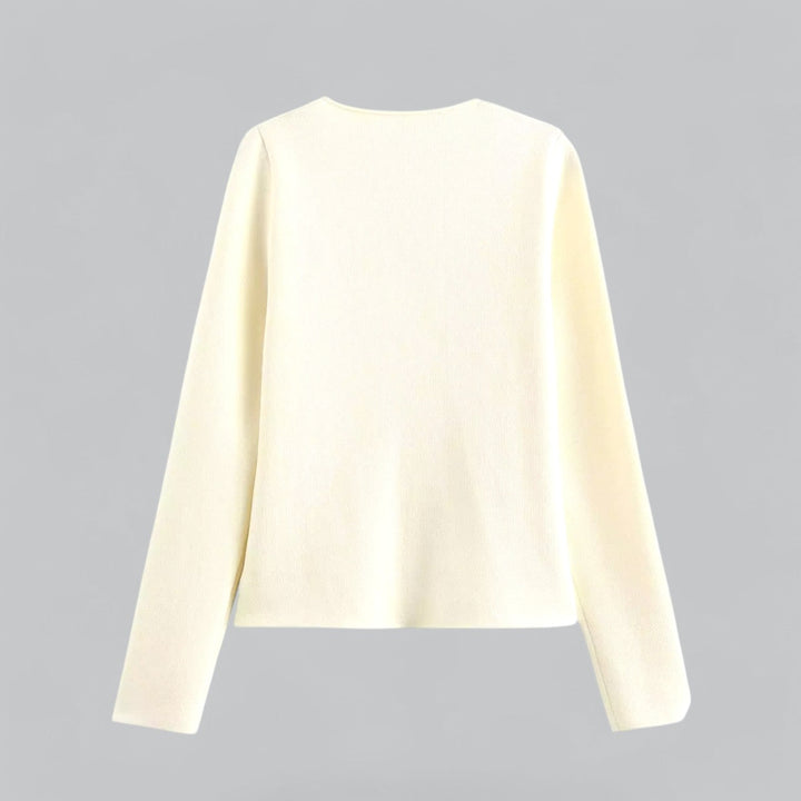 Full view of a women's minimalist knit cardigan, showcasing its casual yet chic spring/summer style.