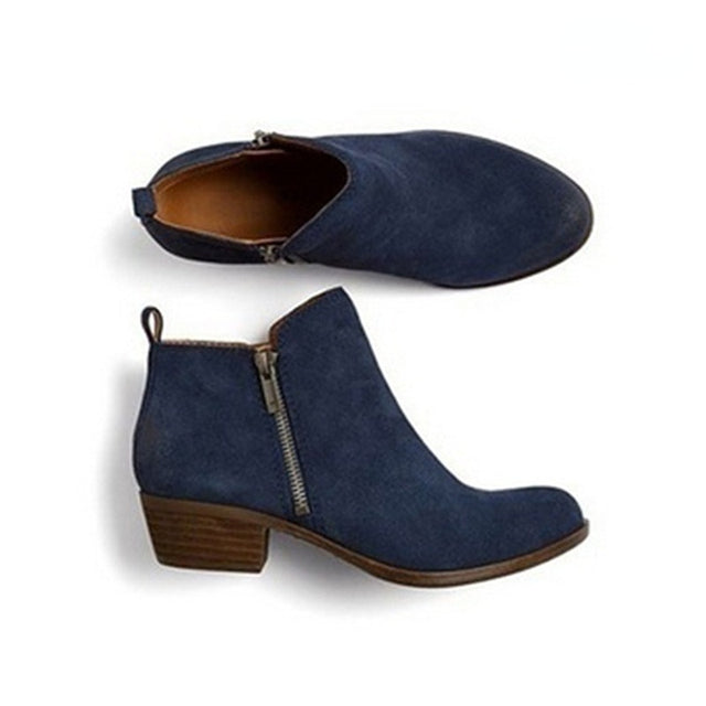 Versatile women's ankle boots with a practical side zip, block heel, and rounded toe for fall/winter style.