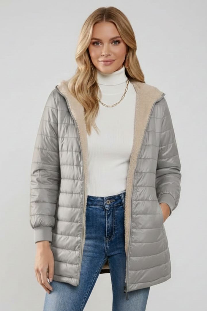 Everyday women's zip jacket with hood, a comfortable and fashionable outerwear piece.