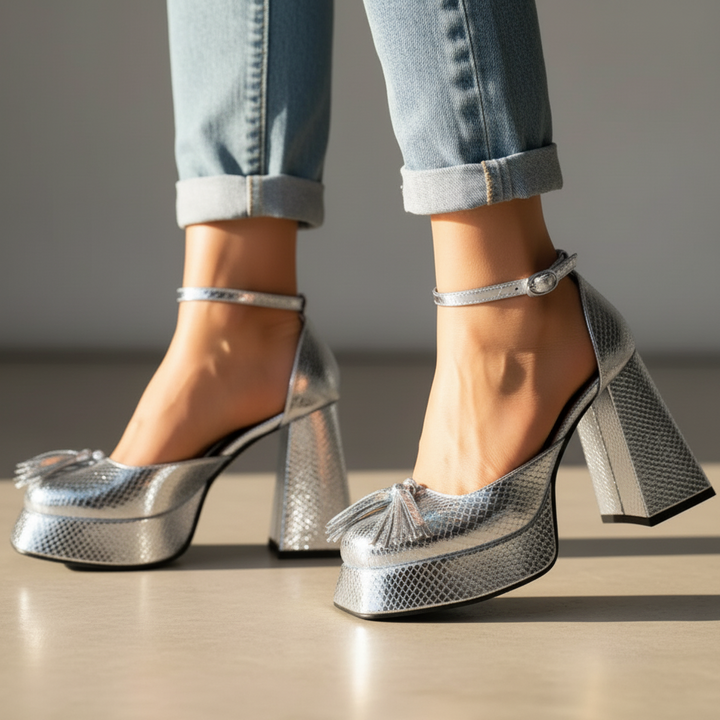 Luxurious women's midnight heels with exotic tassel, supportive square heel & elegant ankle strap.