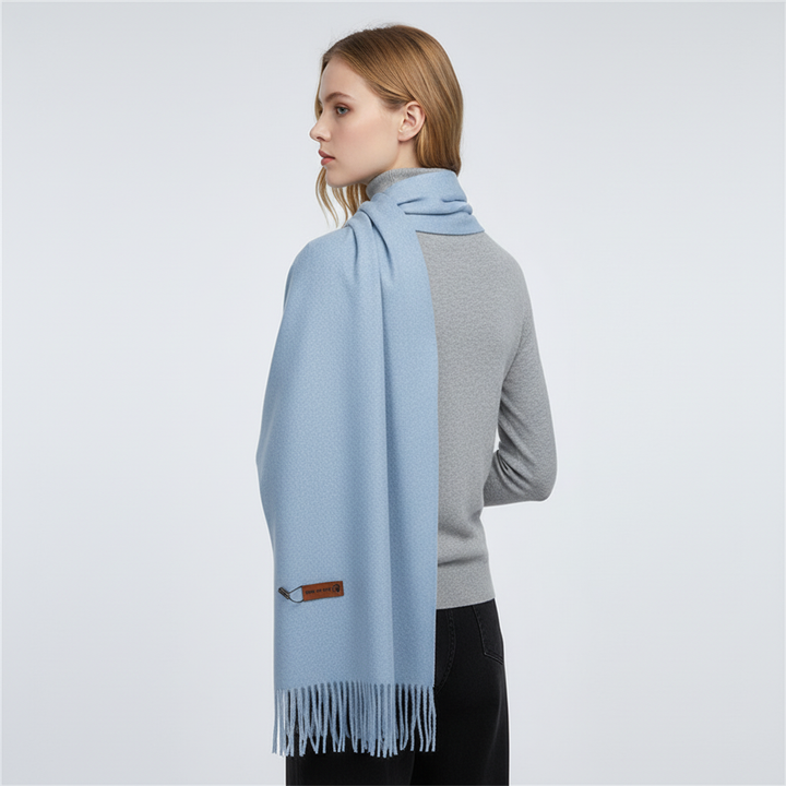 Versatile women's large winter scarf. Soft, oversized wrap for cozy comfort and elegant style on chilly days.
