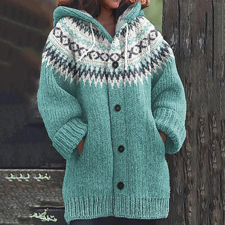 Women's Fair Isle hooded cardigan in a vibrant color, highlighting its unique knit pattern and comfortable design.