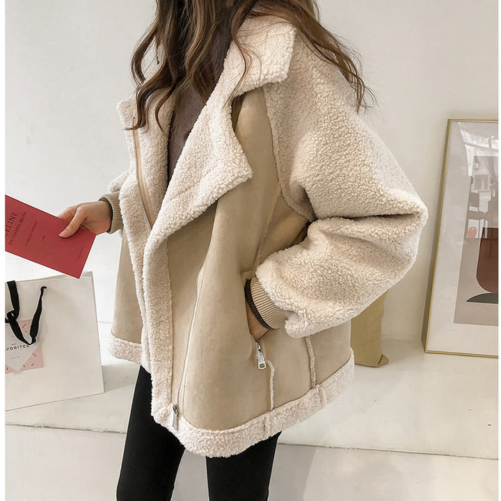 Women's faux shearling oversized winter coat, plush and warm, in a neutral tone, perfect for casual winter fashion.