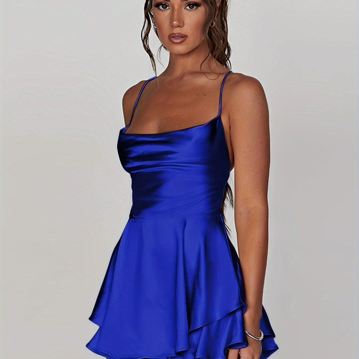 Women's fitted ruched mini cocktail dress, tiered style, ideal for special occasions.