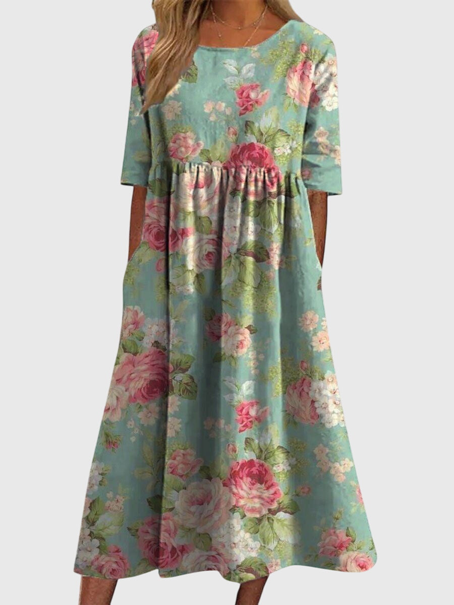 Elegant women's embroidered flowy summer dress, comfortable and versatile for day to night.
