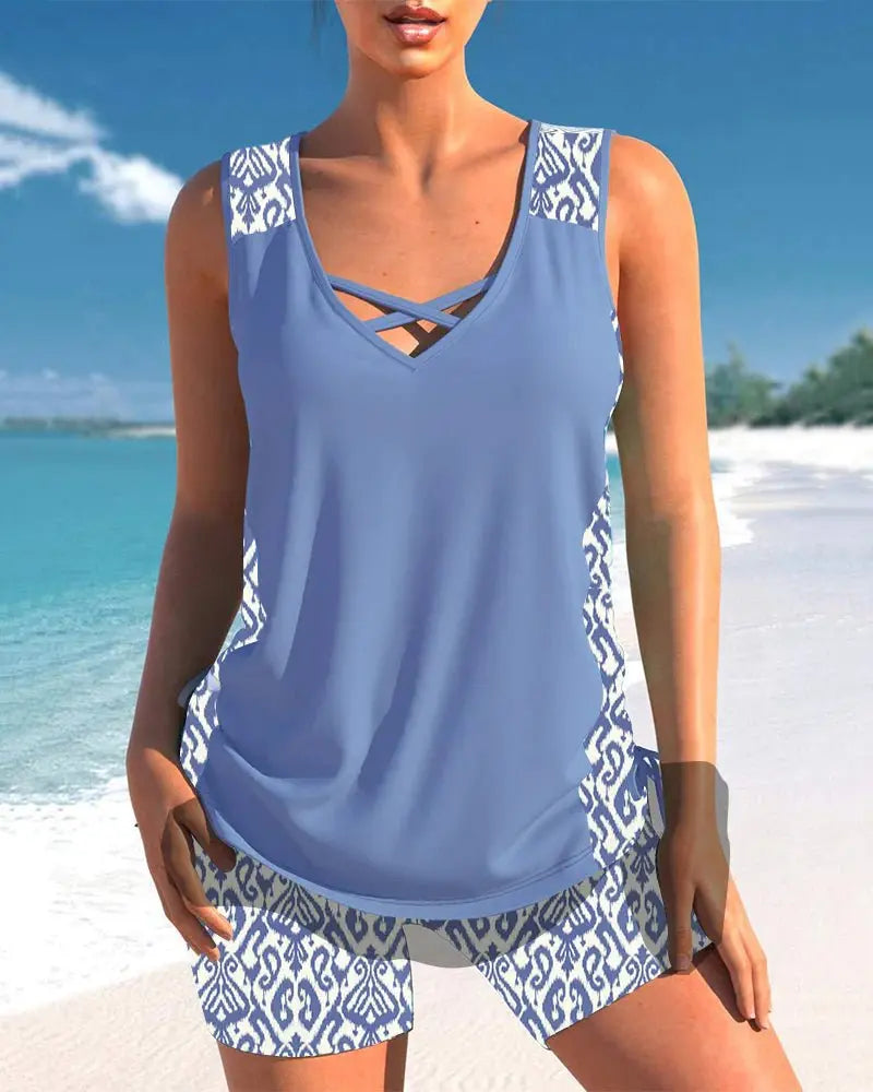 Comfortable women's tankini bathing suit top, features tummy control & adjustable straps for flattering fit.