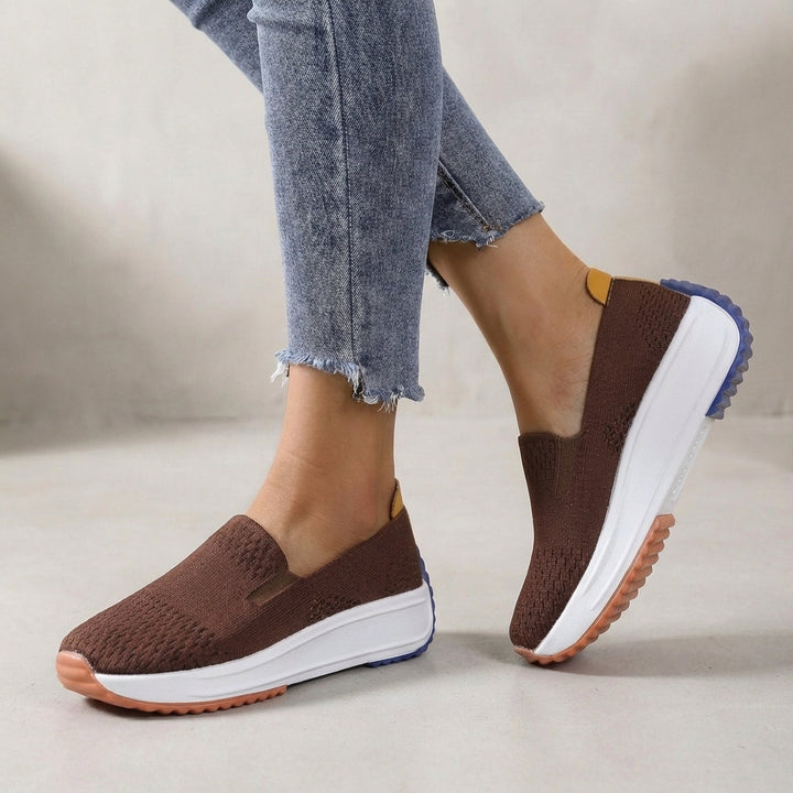 Stylish women's platform orthopedic sneakers. Flexible slip-on design offers superior comfort for casual wear.