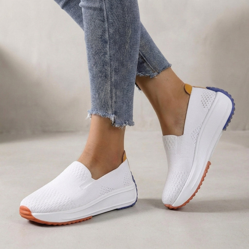 Women's easy-wear slip-on sneakers. Features a flexible platform and orthopedic support for comfortable walking.