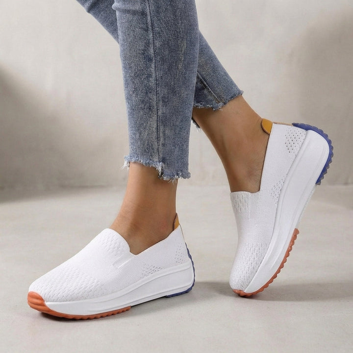 Women's easy-wear slip-on sneakers. Features a flexible platform and orthopedic support for comfortable walking.