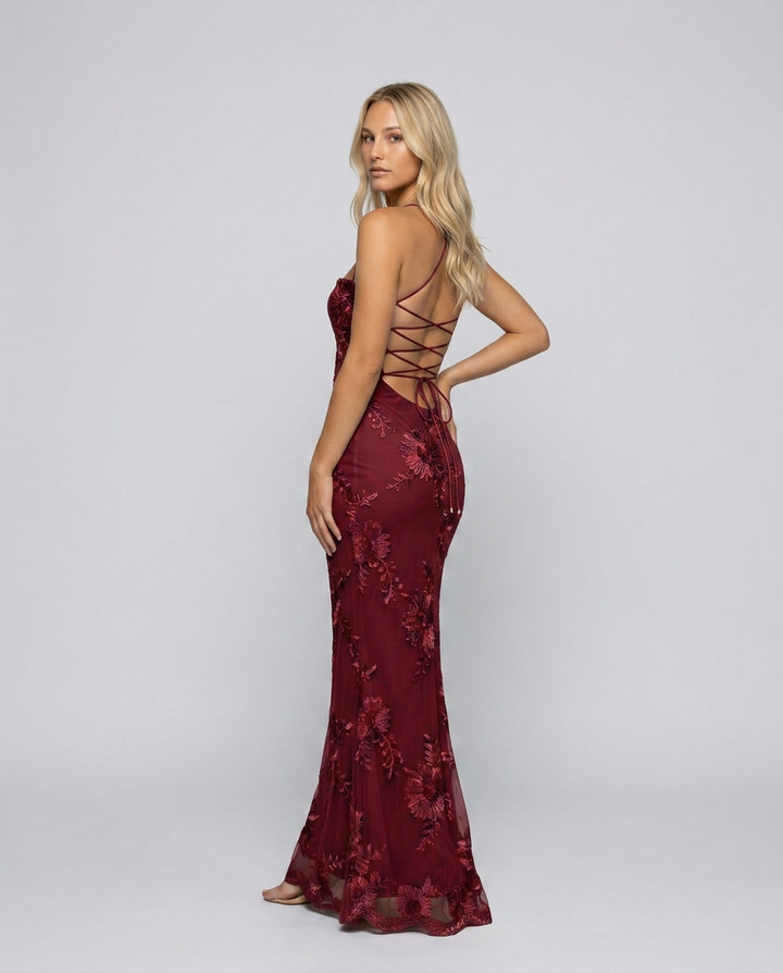 Beautiful women's floral long dress with an elegant lace-up back, perfect for a wedding guest.